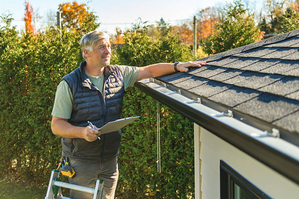 Professional Roofing technician working in East Rochester, NY